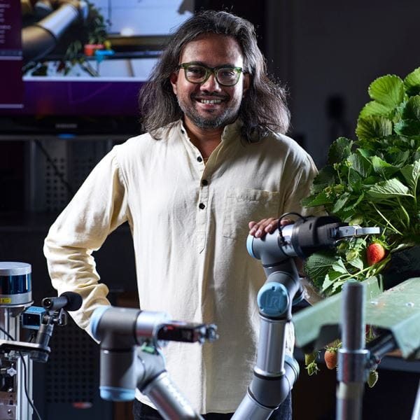 Vishwanathan Mohan with the strawberry-picking prototype.