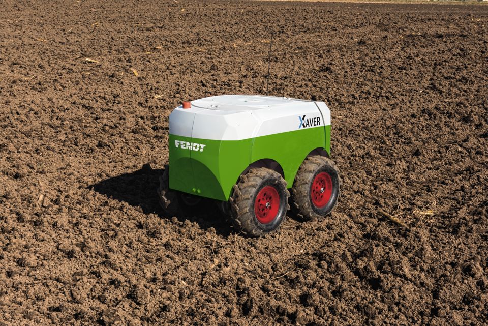 An earlier four-wheel Fendt Xaver robot on cultivated soil.