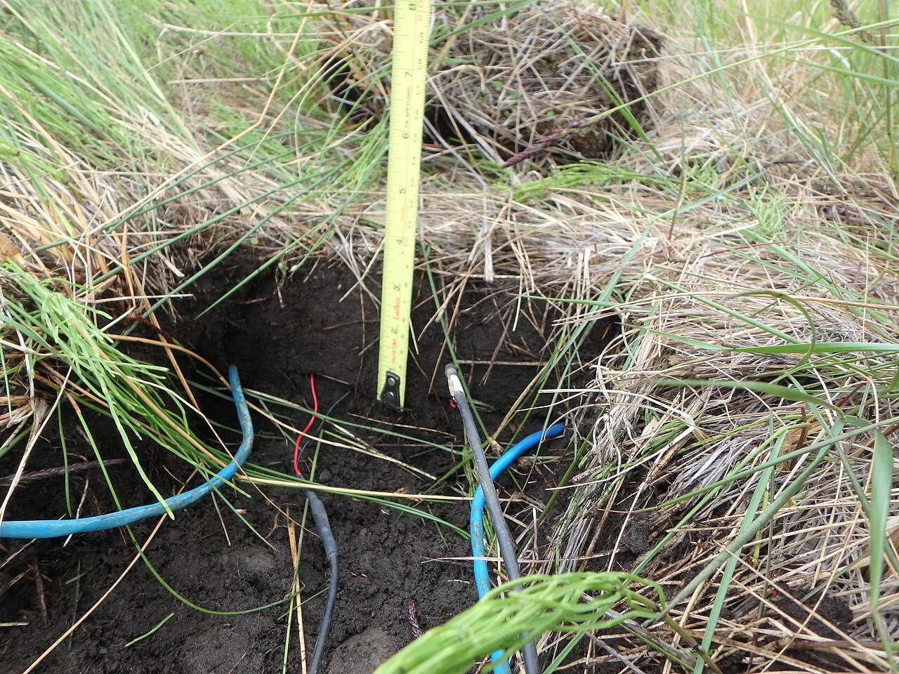 Installation of sensors in a soil profile.