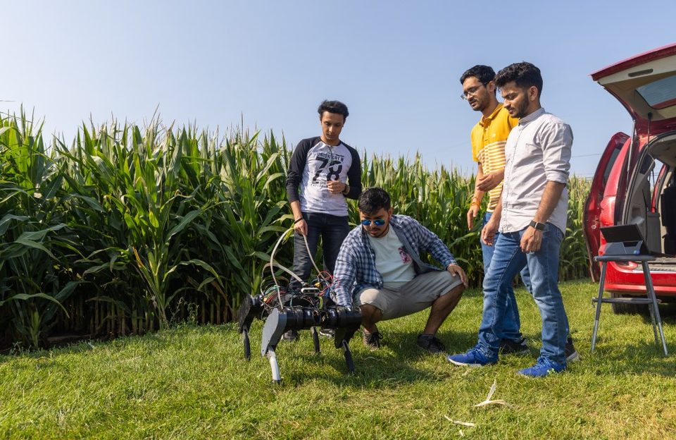 Ce Yang’s laboratory team with its OmniAgrobot quadruped prototype.
