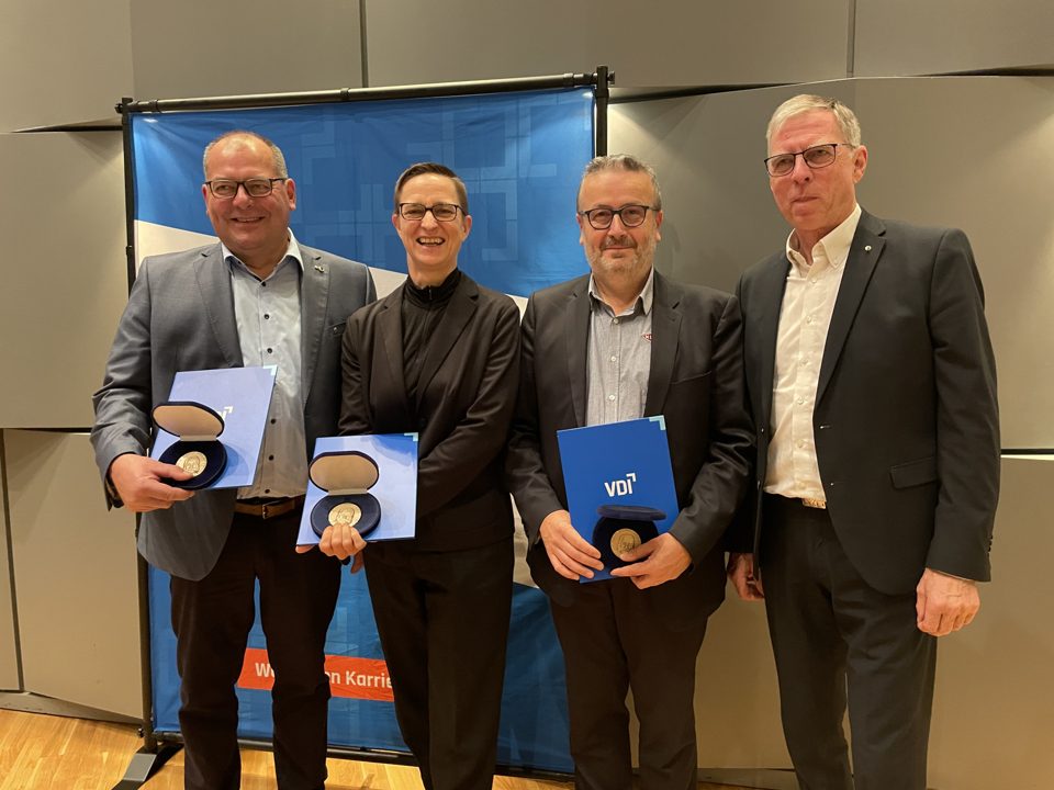 Cornelia Weltzien with fellow honourees and the award presenter.