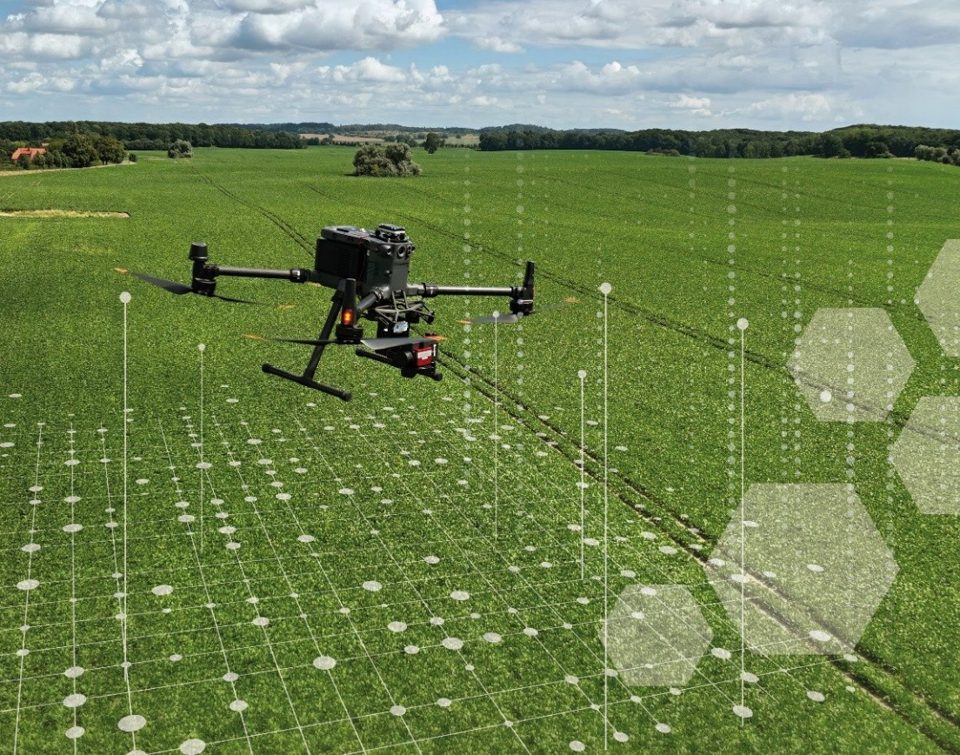 Fraunhofer illustration of a drone above farmland with digital data overlays.
