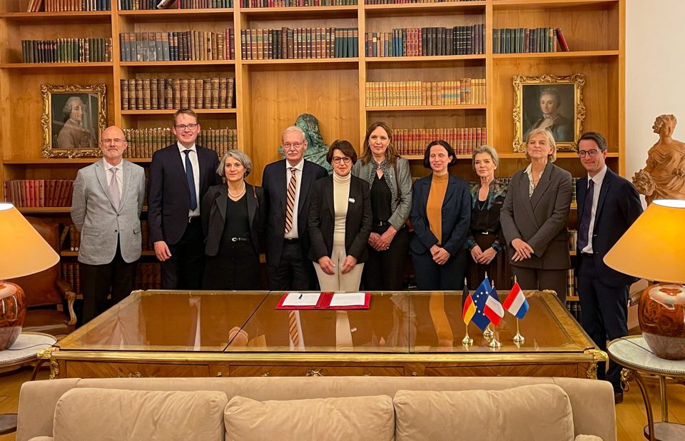 Participants at the robotics agreement signing in Berlin.